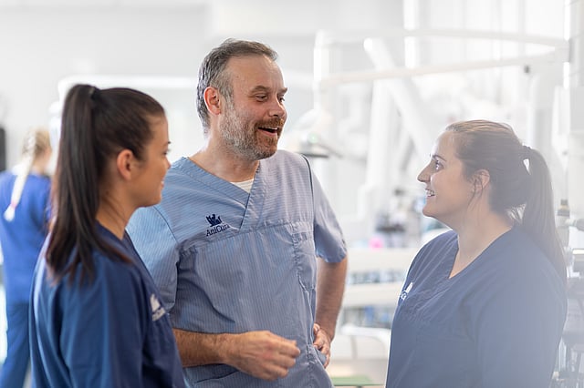 A group of people in scrubs.